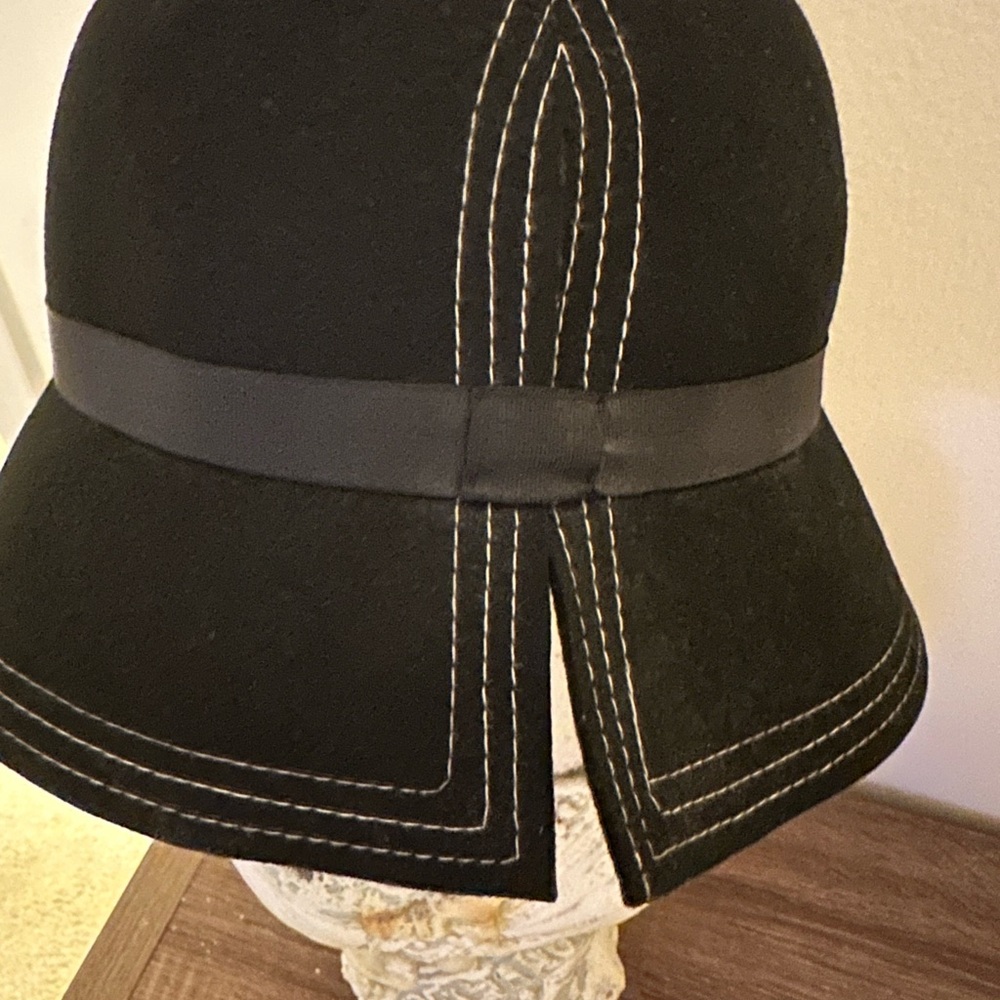 Black wool hat with top stitching and embellishment